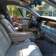 Illustration for article titled At $7,500, Would You Go To Town In This Custom 2000 Lincoln Town Car Station Wagon?